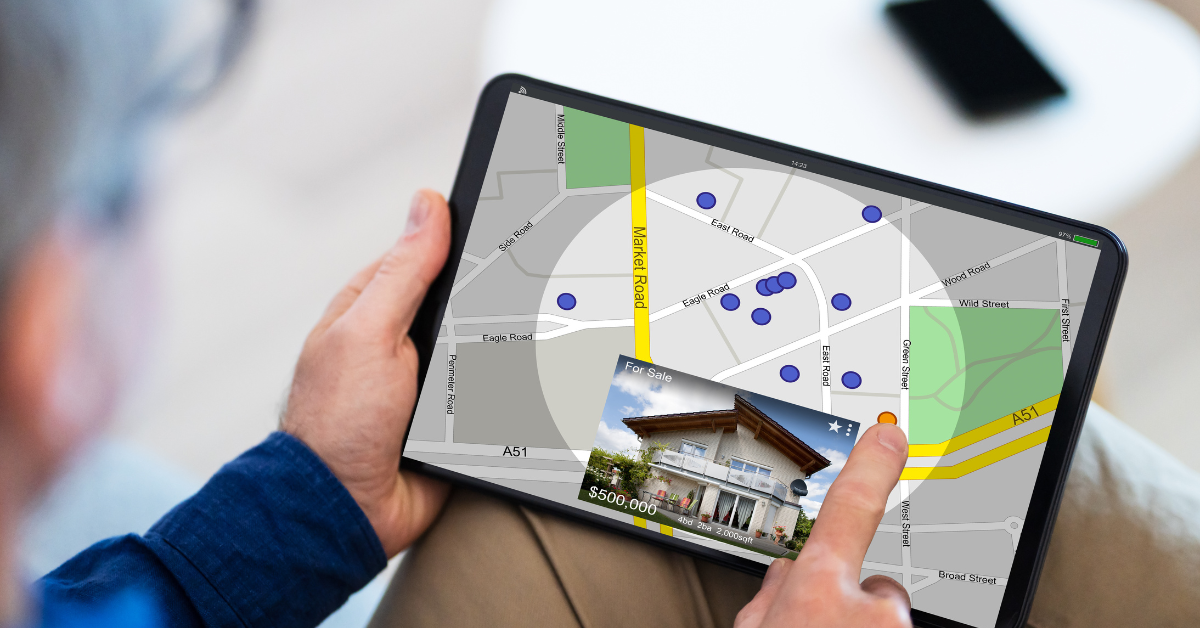 how to start with small investment property to build wealth - image of a person holding a tab showing a property location and picture of the property
