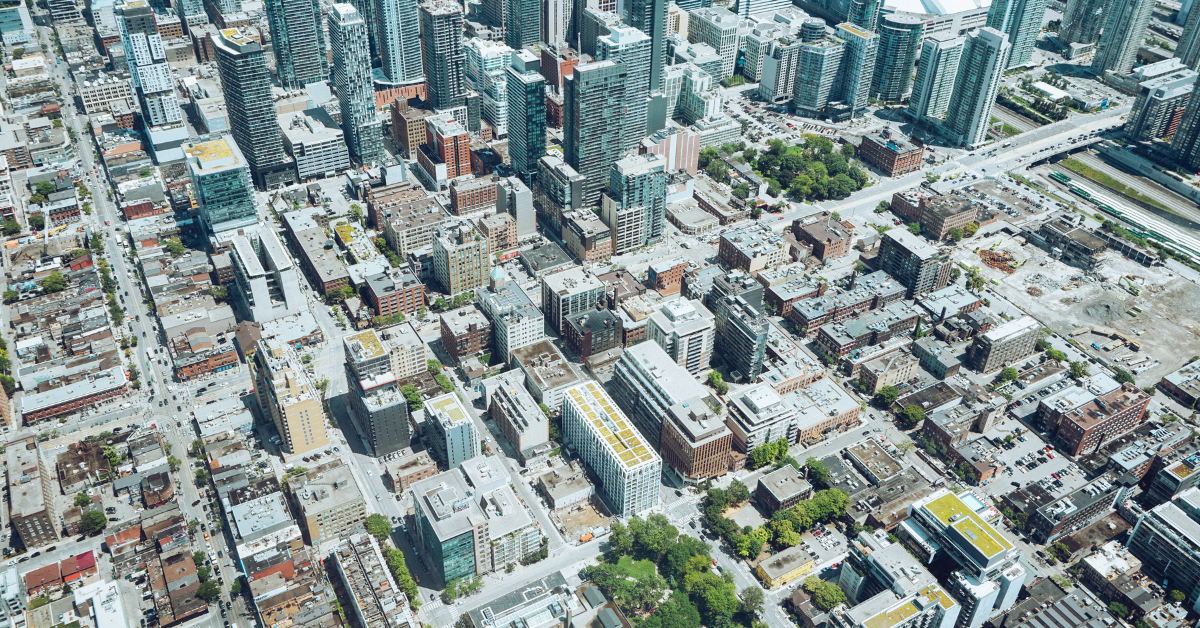 Property Portfolio - Landscape view of a city showing a lot of real estate commercial and residentials buildings