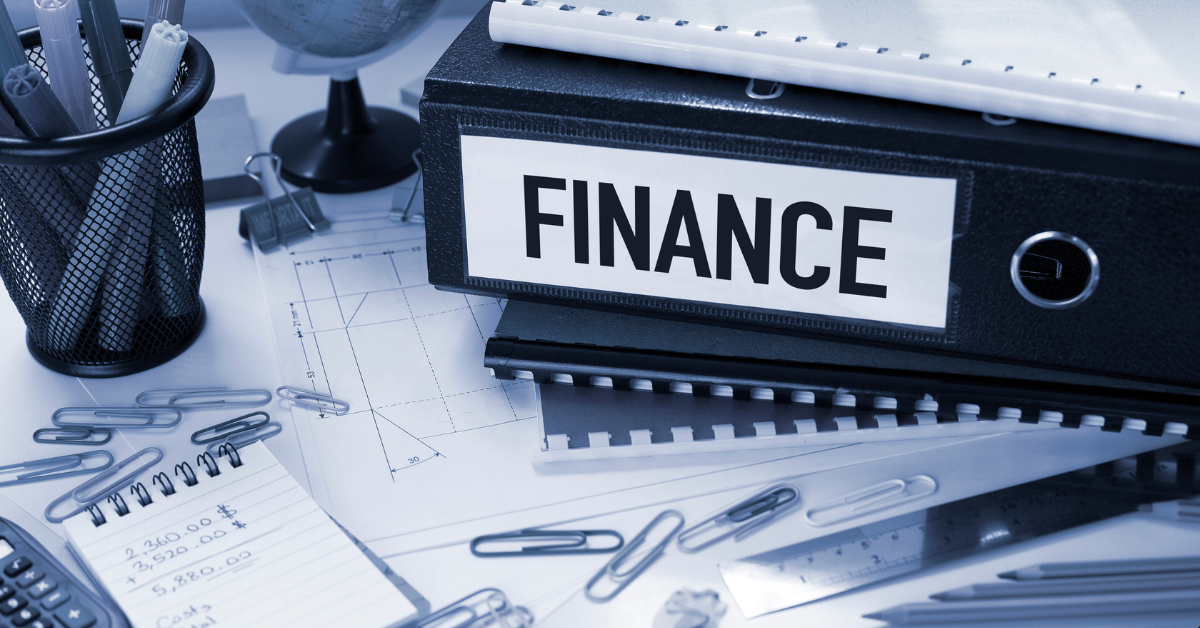 Property investment Financing - A File with Financial Documents, James Clips and A calculator with notebook