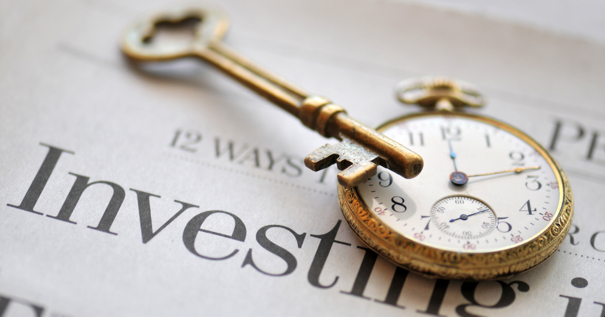 Property Investment - A Paper Indicating Investments and there is a stopwatch and door keys over the paper