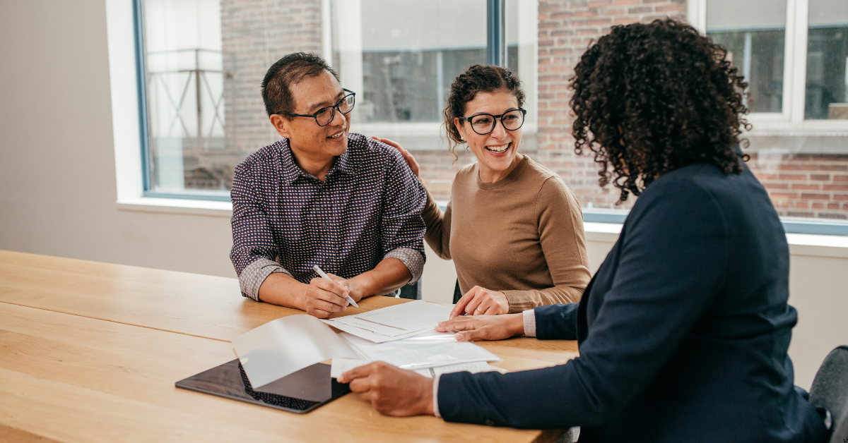 Investment Property - Image of a couple discussing investment property option with a professional