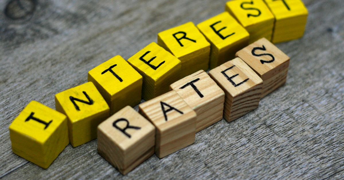 A block of alphabetical woods forming the word Interest Rate