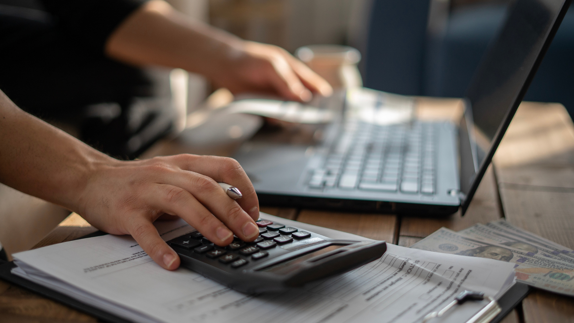 Image of Man Calculating LMI Costs and Savings