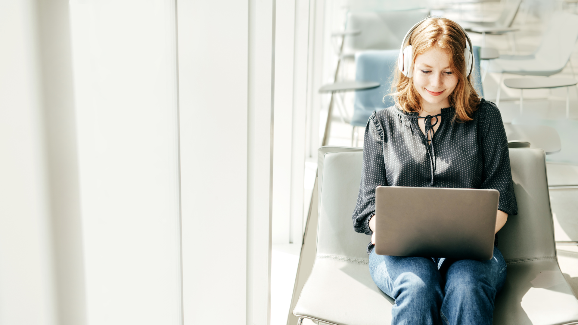 Tips for Managing LMI Costs in Property Investment - Woman working on a laptop 
