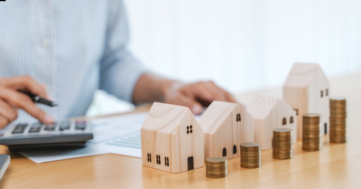 Building Wealth Through Property - Person Calculating To Build Wealth With Property